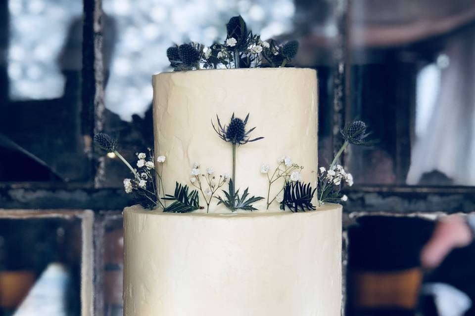 Textured buttercream with fresh thistles