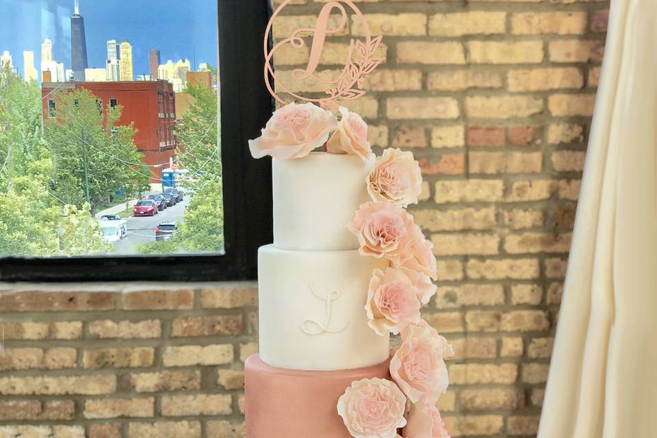 3 tier cake with pink base