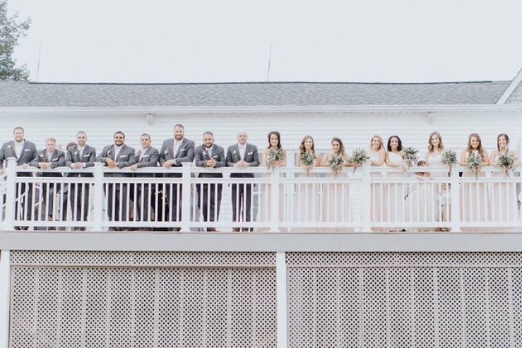 The couple with their bridesmaids and groomsmen