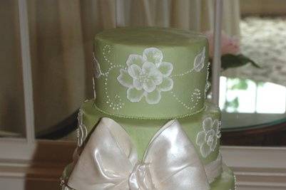 Sage buttercream with a great pearlized sugar bow