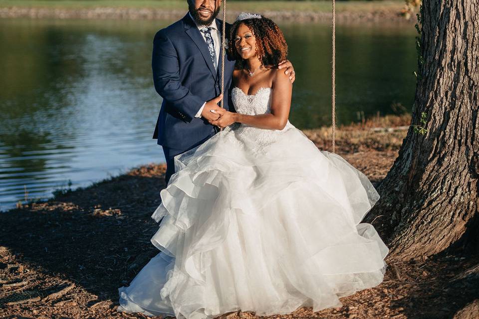 Bride on a Swing with Groom