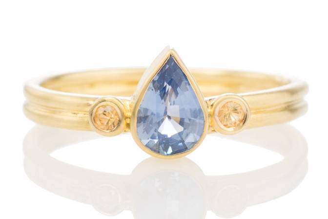 Blue sapphire engagement ring with yellow sapphires. One of a kind. Handmade in 18k yellow gold.