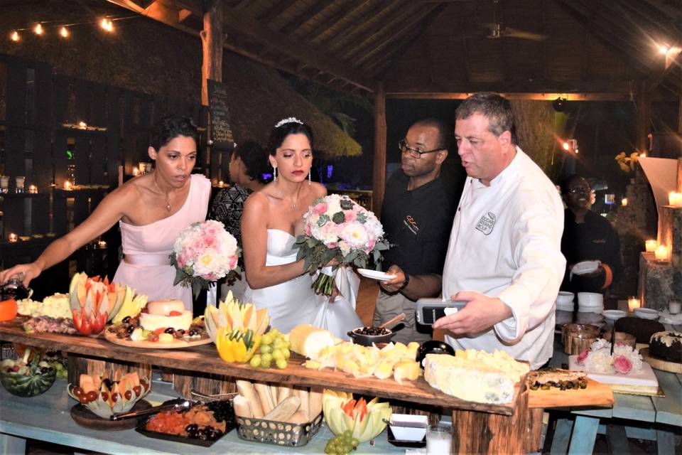 Cheese Table - bride looks on.