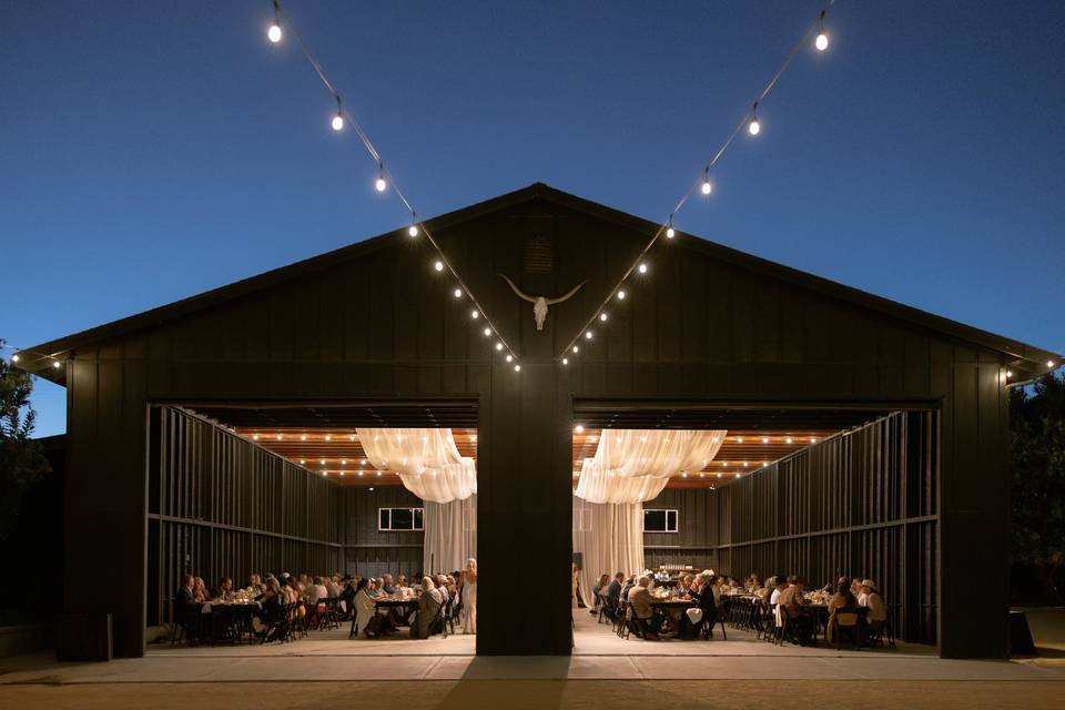 Black Tuxedo Barn at Night