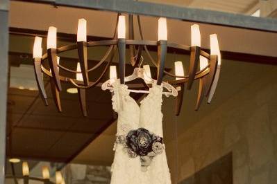 Bridal gown on chandelier