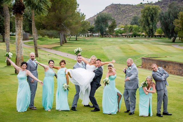 Newlyweds and their wedding party