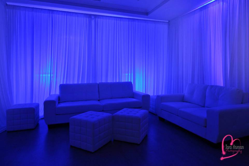 Lounge furniture with premium draping and uplighting rental in orlando