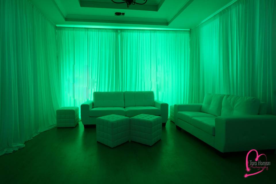 Lounge furniture with premium draping and uplighting rental in orlando