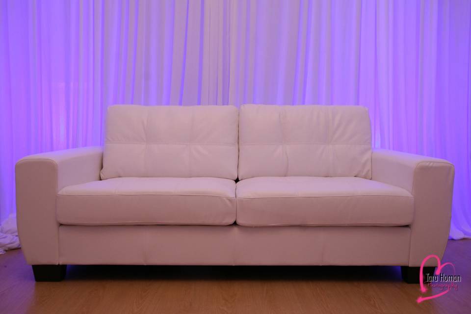 Lounge furniture with premium draping and uplighting rental in orlando