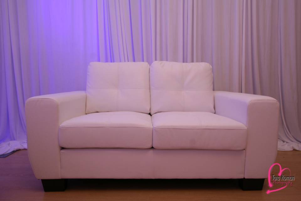 Lounge furniture with premium draping and uplighting rental in orlando