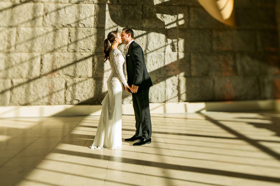 Newlyweds kissing