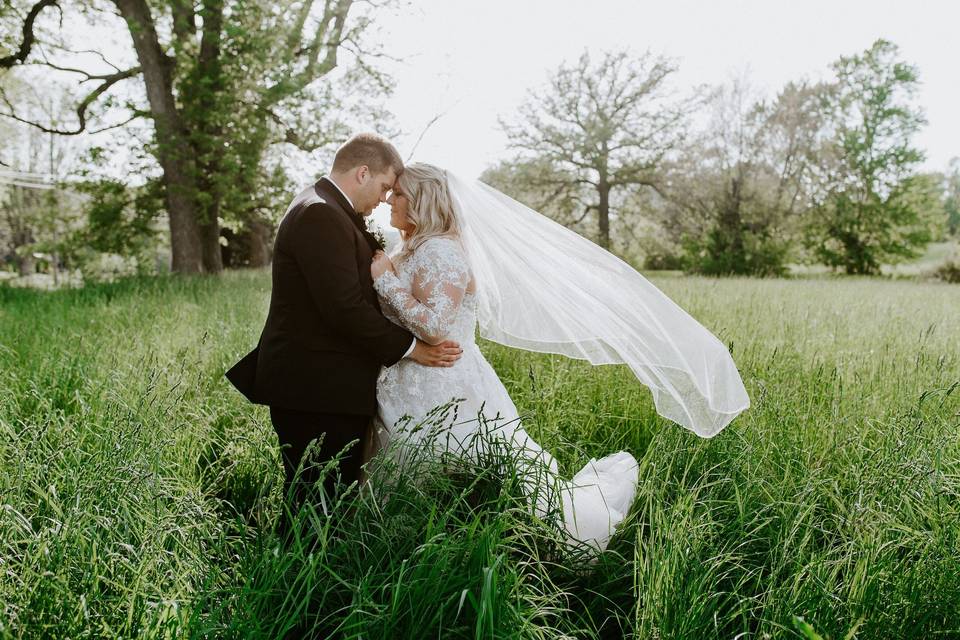 Bride and Groom in Field