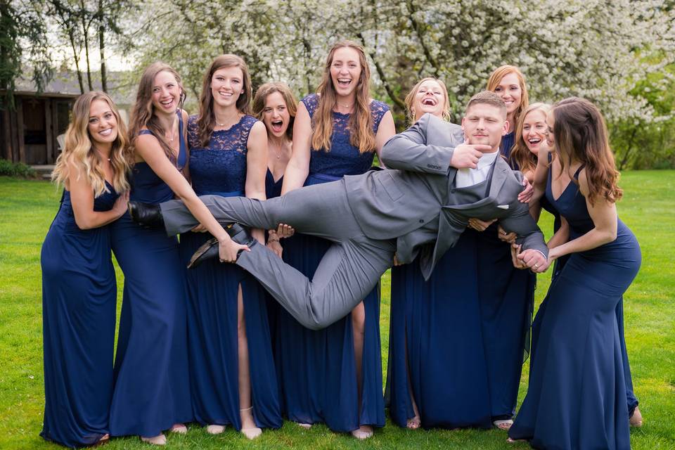 Groom with bridesmaids