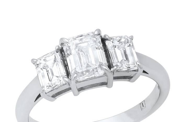 3 stone emerald cut ring