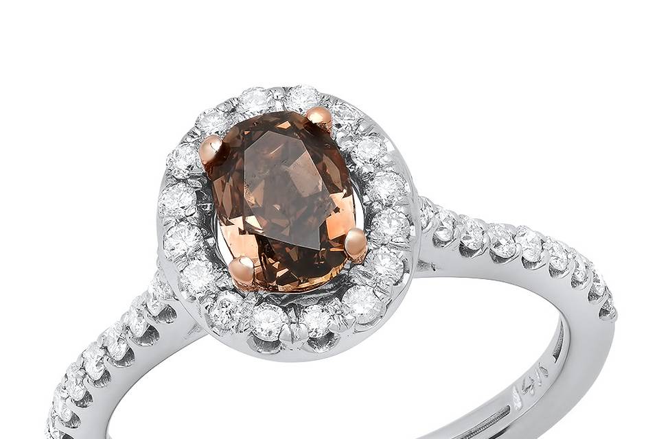 Oval colored diamond ring