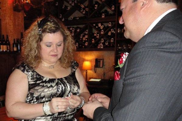 Re-dedicating their wedding rings in a vow renewal ceremony