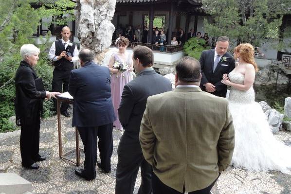 Signing their marriage license in a civil ceremony (Chinese Scholar's Garden at Snug Harbor)
