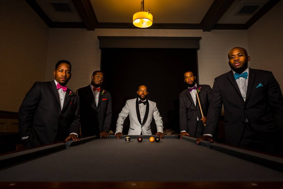 Groomsmen at pool table