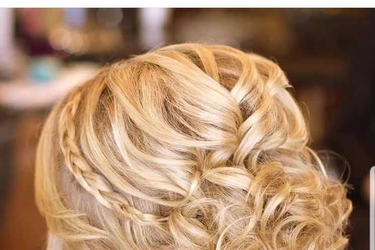 Updo with curls and braid accent