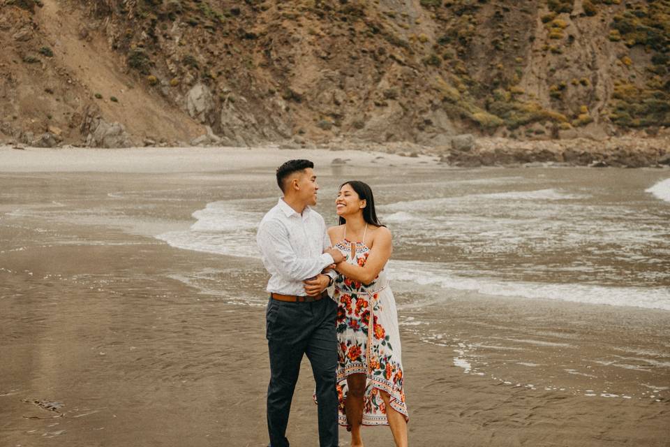 Couple's walk by the sea