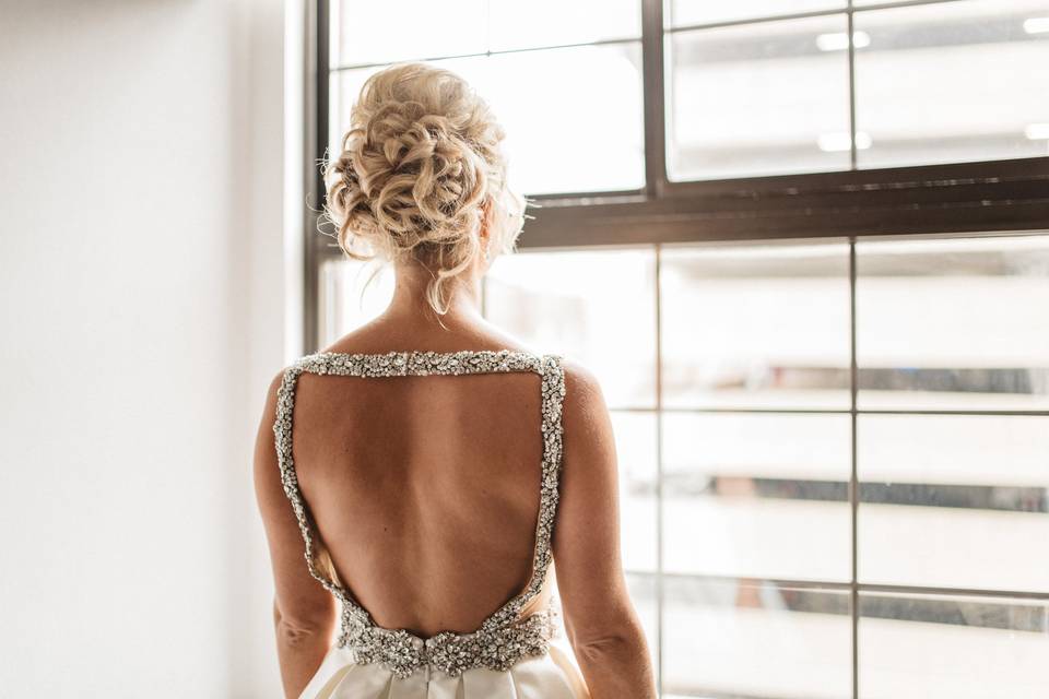 Dress details and bridal hairdo