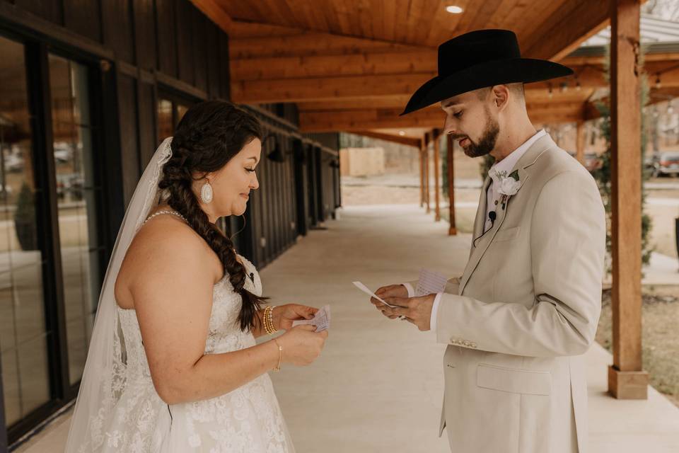 Reading vows on front porch