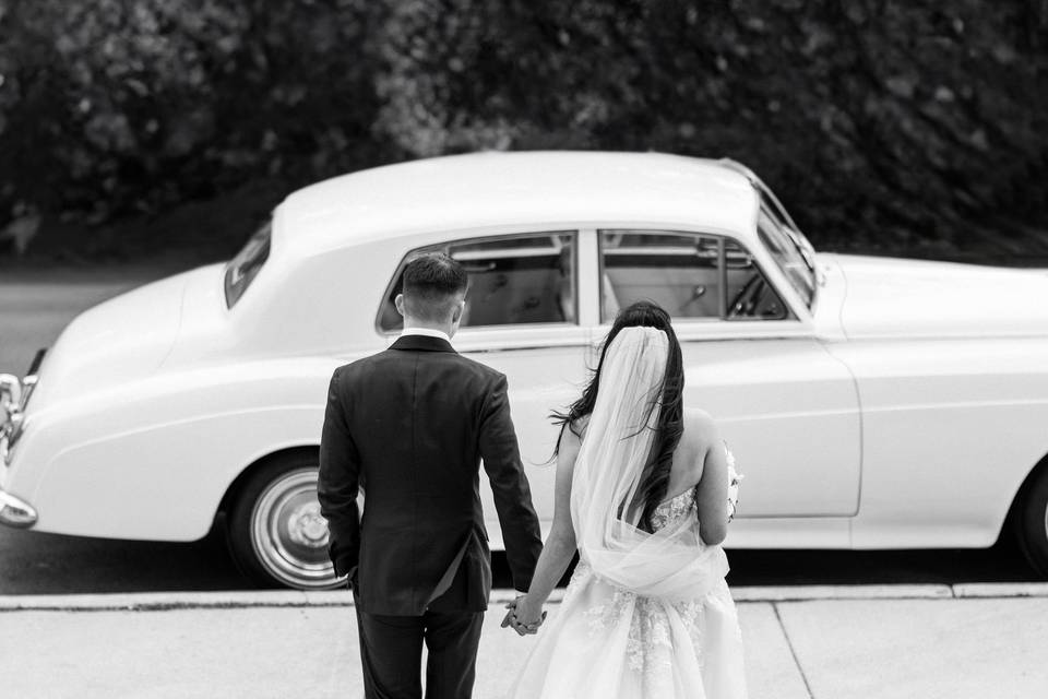 Bride and groom getaway car