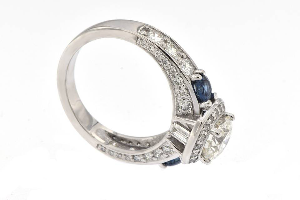 Sapphire accents in halo ring