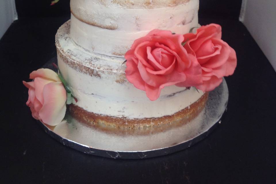 Naked wedding cake with flowers