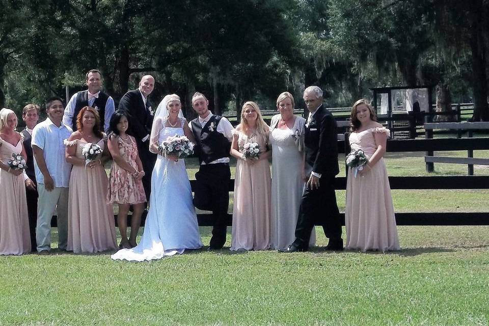 The couple with their bridesmaids and groomsmen