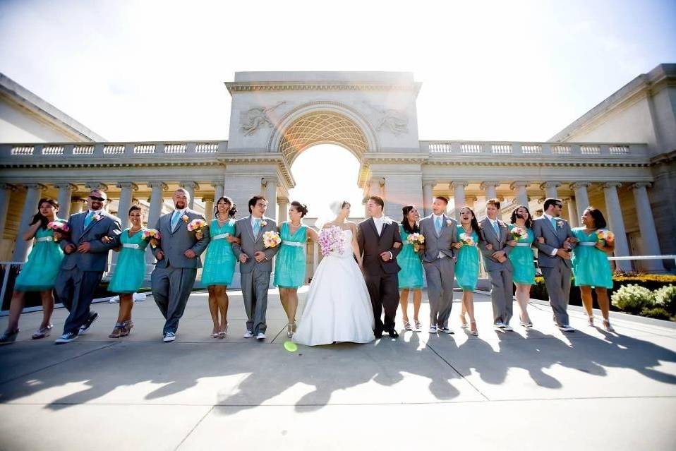 The couple with the bridesmaids and groomsmen