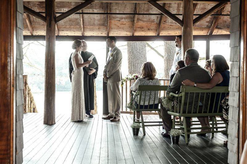 Photo courtesy of aaron spagnolo photography. Ceremony on covered deck of needles lodge.