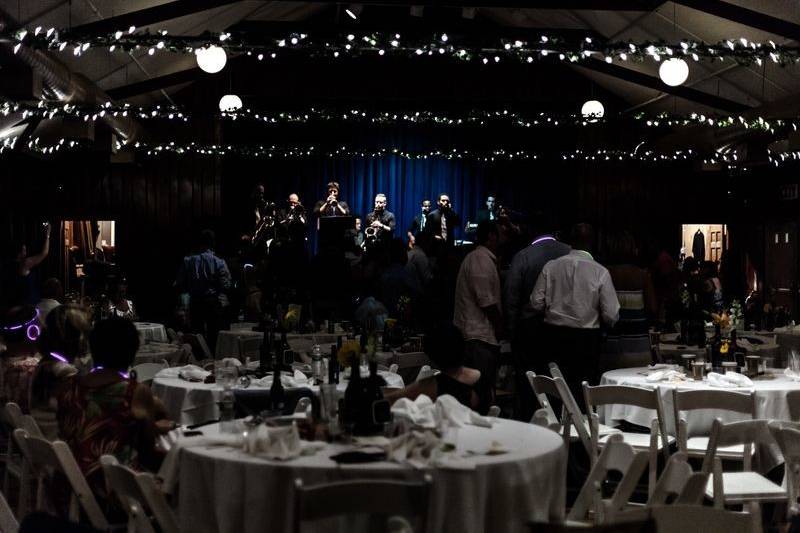 Photo courtesy of aaron spagnolo photography. Band on stage in needles lodge