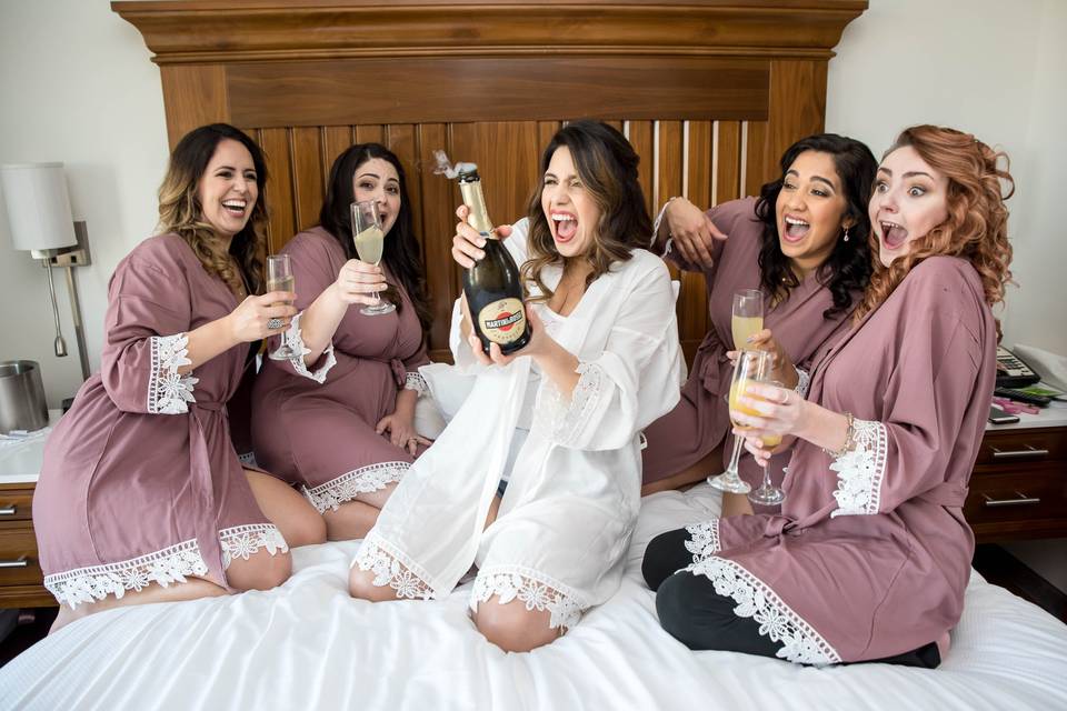 Bridal party having fun - Jesse Giles Photography