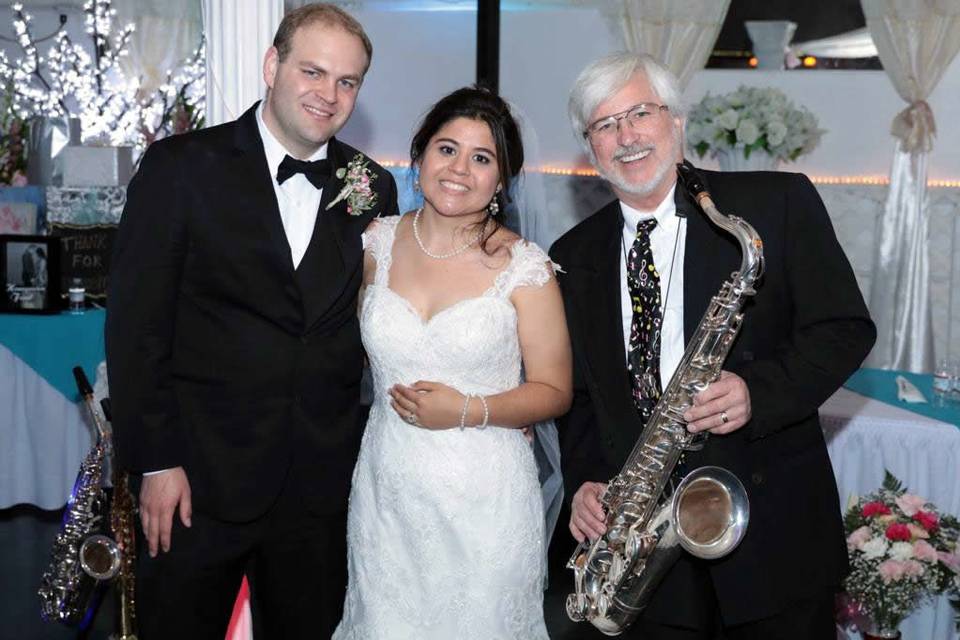 Newlyweds with the saxophonist
