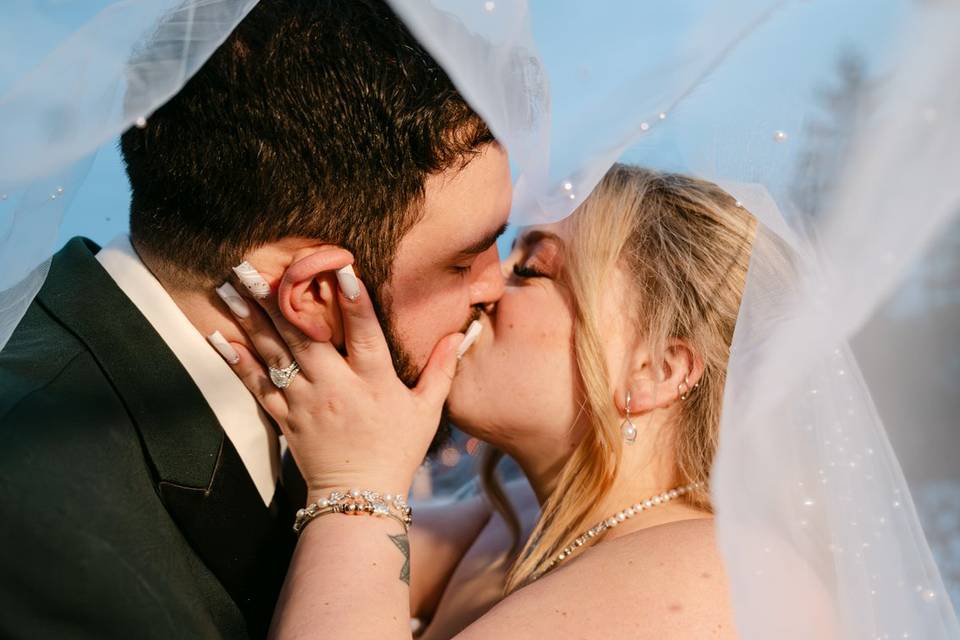 Kissing under vail