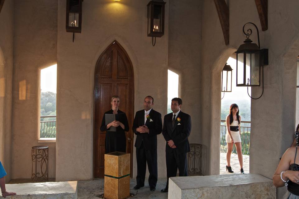 Officiant waiting with the groom