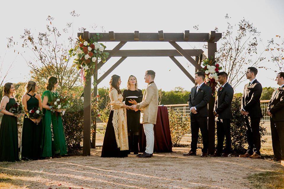 Wedding outside under an arch