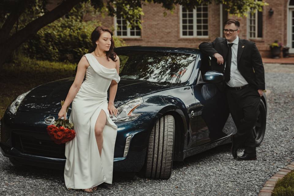 Bride and groom sports car