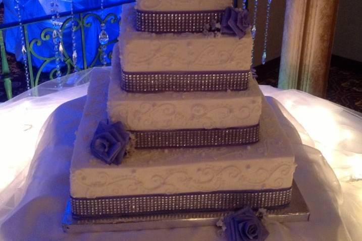 4-tier square cut wedding cake