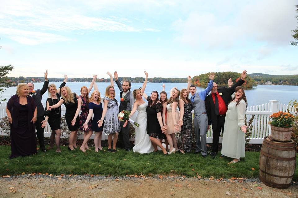 The couple with the bridesmaids and groomsmen