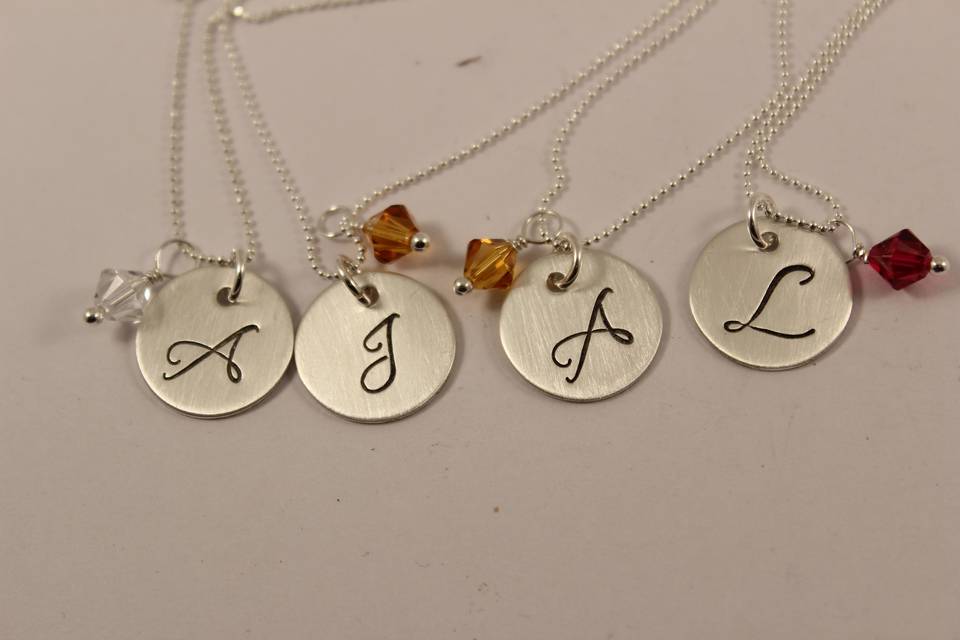 Sterling silver initial necklaces... Excellent bridesmaid gifts!