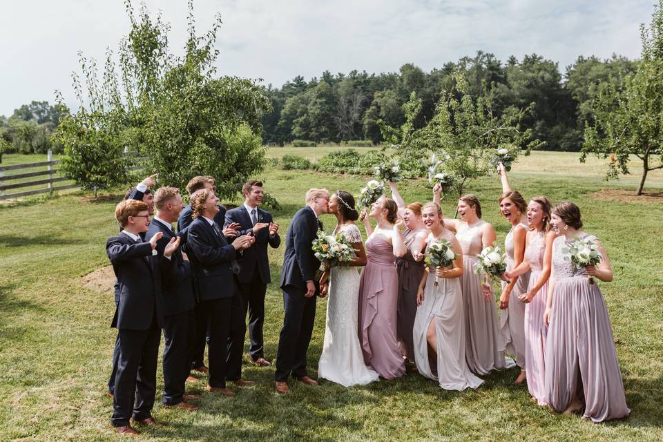Wedding party in the orchard