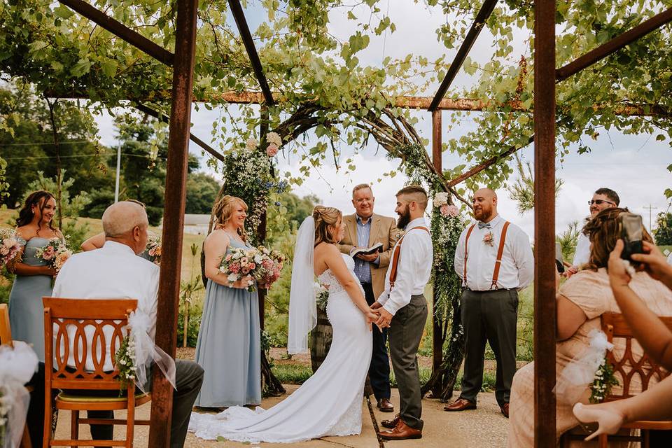 Happiness under the grape arbo