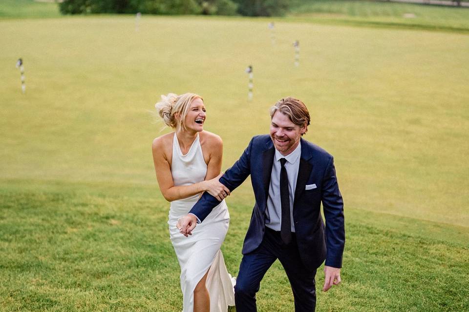 Bride and groom laughing