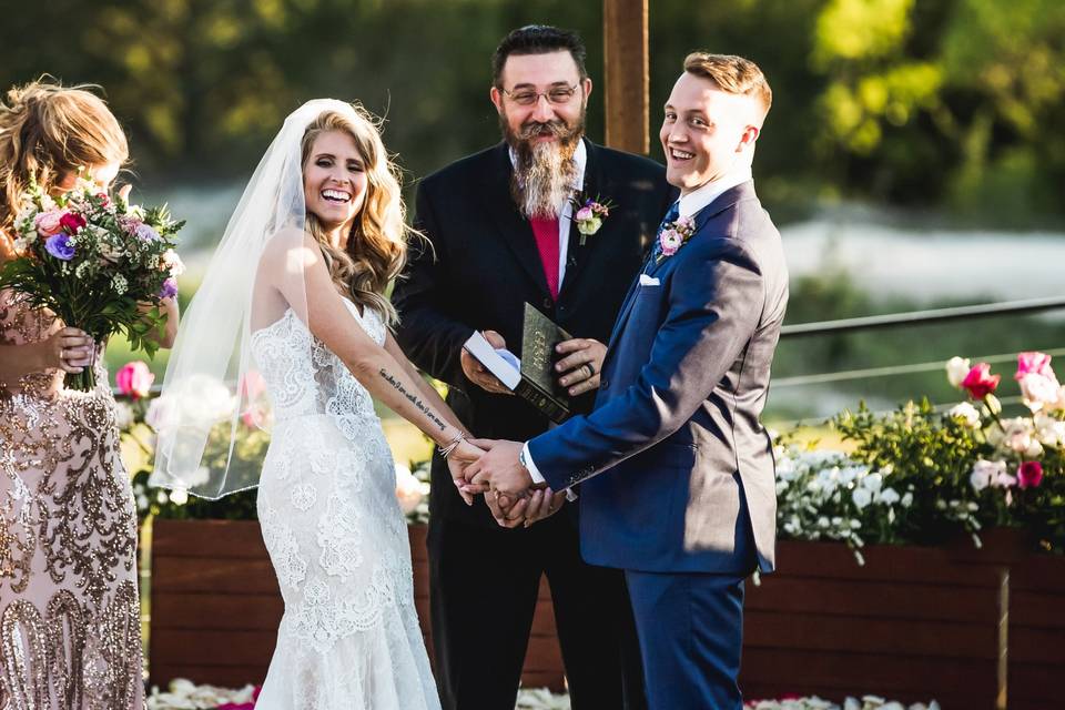 Couple laughing at ceremony