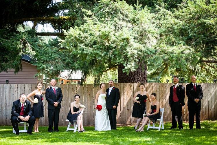 Wedding party posing outdoors