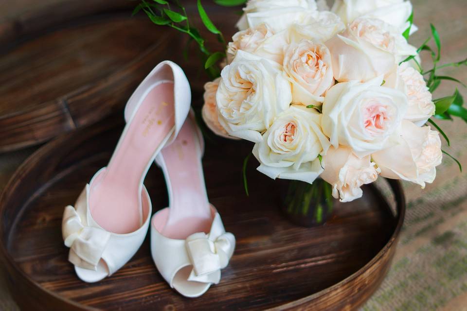Bride's shoes and bouquet