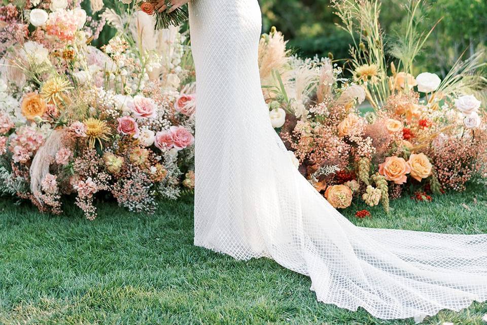 Meagan by her Wedding Arch