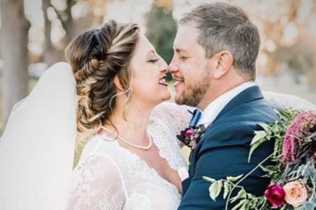 Fishtail Newlyweds holding each other